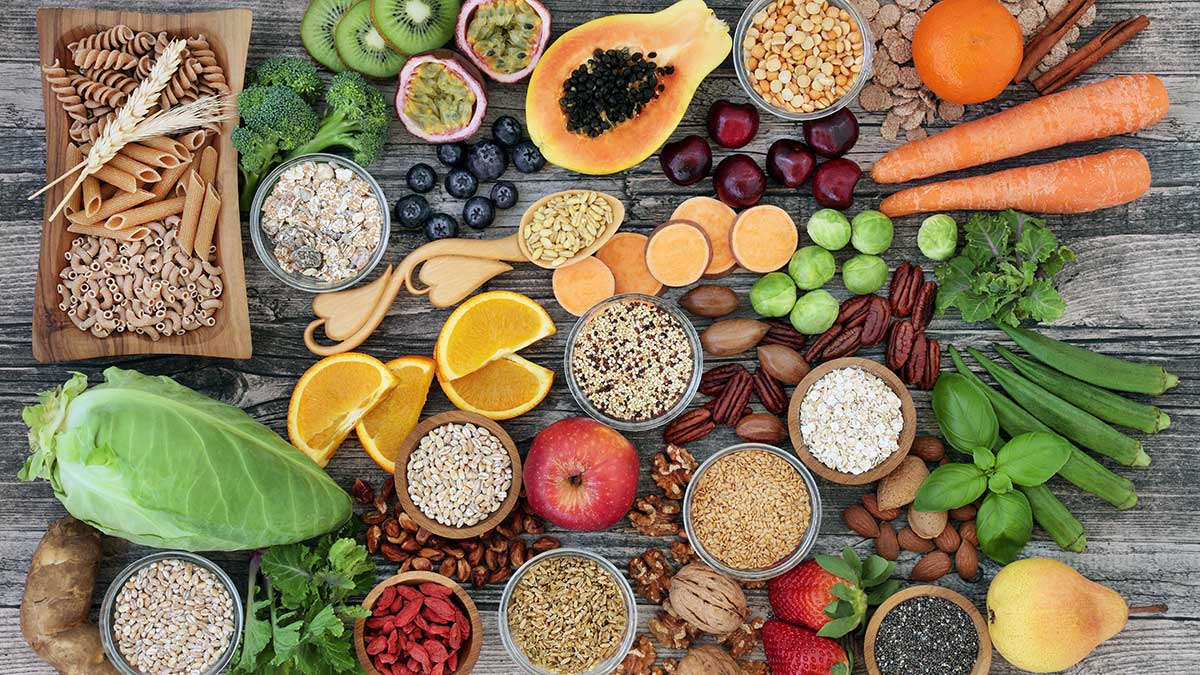 High dietary fibre health foods with fruit, vegetables, whole wheat pasta, legumes, cereals, nuts and seeds with foods high in omega 3, antioxidants, anthocyanins, smart carbs and vitamins.
